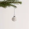 Cilindro 10 soggetti misti in vetro Ø 5 cm bianco