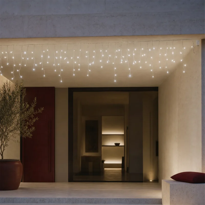 Estalactitas LED a pilas - 180 LEDs Blanco Hielo - juegos de luces con temporizador (6h ON/18h OFF) - L 4,20 m × H máx 50 cm - cable transparente - funciona con pilas - uso exterior