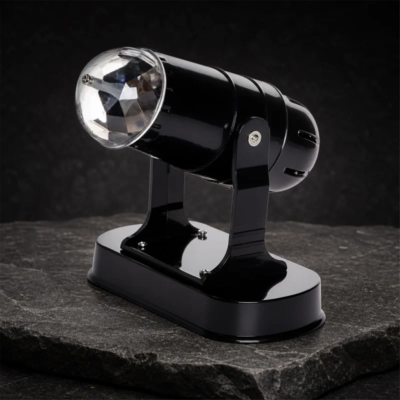 LED projector - 3 multicolor LEDs - rotating light game - 13×7×18 cm - battery operated - indoor use