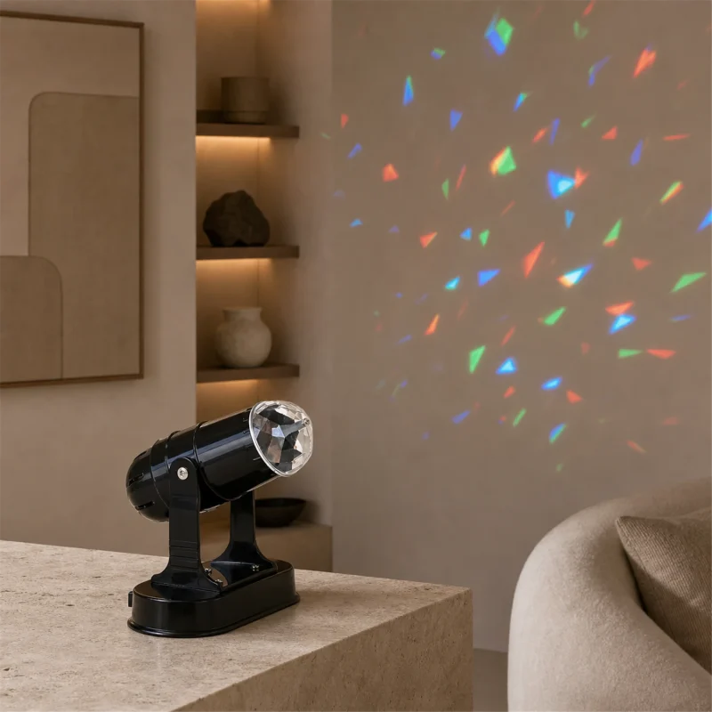LED projector - 3 multicolor LEDs - rotating light game - 13×7×18 cm - battery operated - indoor use