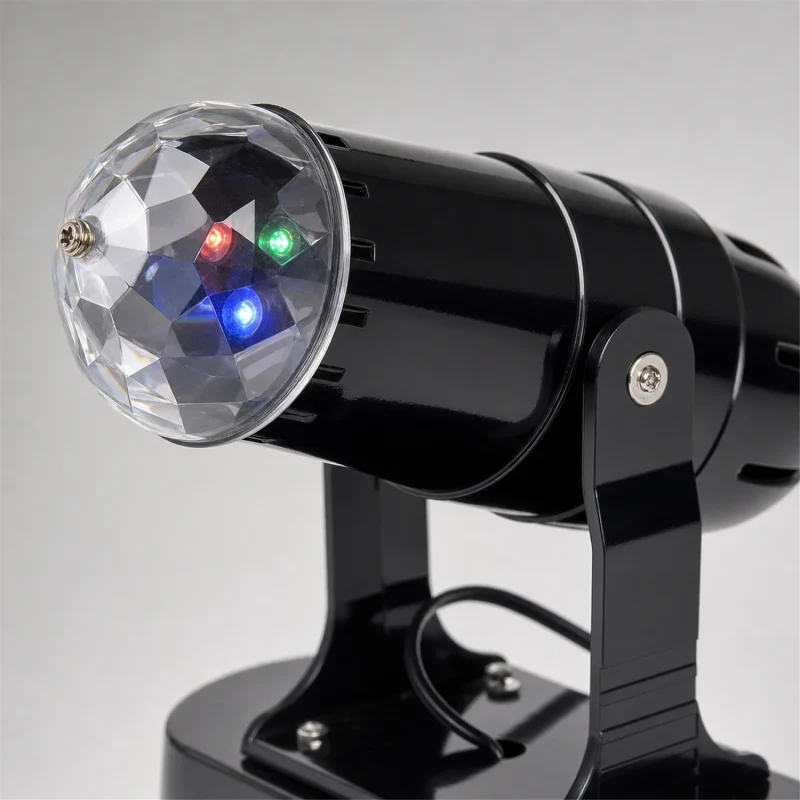 LED projector - 3 multicolor LEDs - rotating light game - 13×7×18 cm - battery operated - indoor use